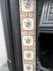 Original fireplace floral tiles