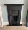 Original Edwardian cast iron surround, a decorative feature on a bedroom