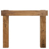 The New York wooden fireplace surround, crafted with precision and detail that see he shelf crosses in front of the legs and extends beyond their width, creating an impressive focal point