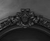 close up of the intricate floral design of the curved arched insert