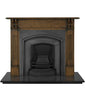 An Early Victorian  traditional black cast iron fireplace insert with an elegantly simple and wide half-arched opening.