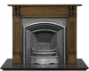 An Early Victorian  traditional black cast iron fireplace insert in a full polish finish with an elegantly simple and wide half-arched opening