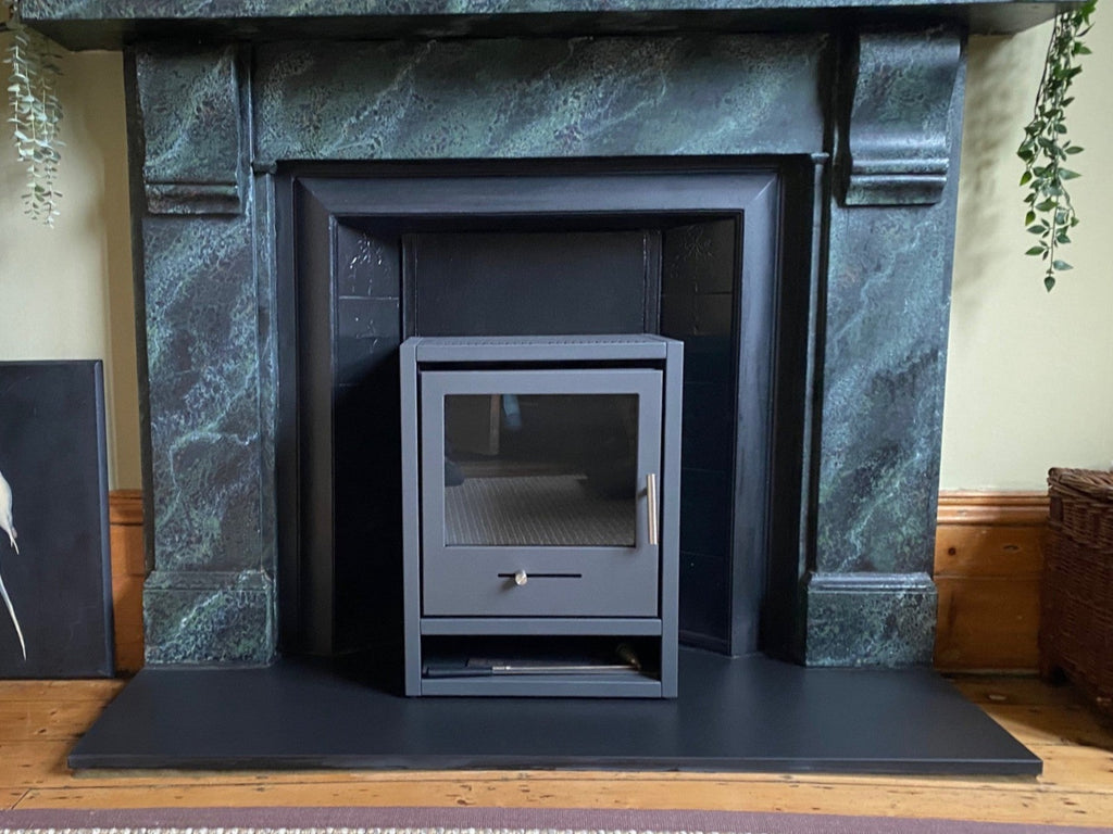 Trompe l'Oeil slate inspired surround complements OKO S1 bioethanol stove the alternative to a wood burning stove