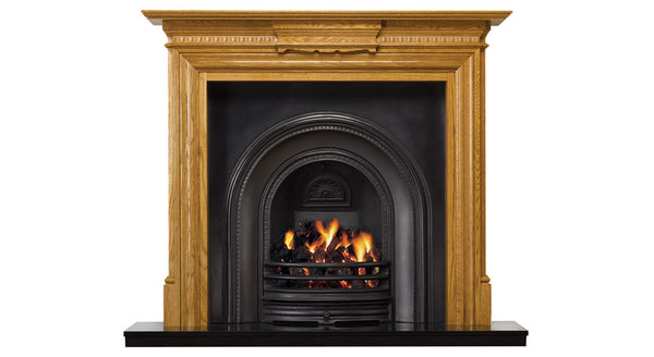 The Chatsworth wood mantle in an Antique Pine finish