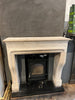 Impressive rustic stone French style surround with bevelled detail