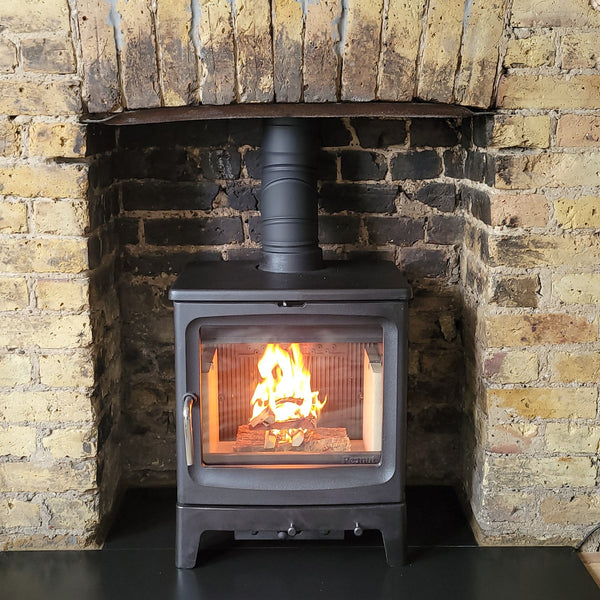 Recently installed the Bignut 5 wood burning stove featuring the cleaned brickwork chamber